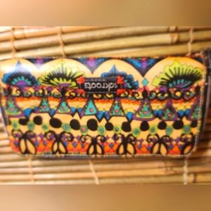 Sakroots Zip Around Wallet. Measures: 8.5" X 4.5". 